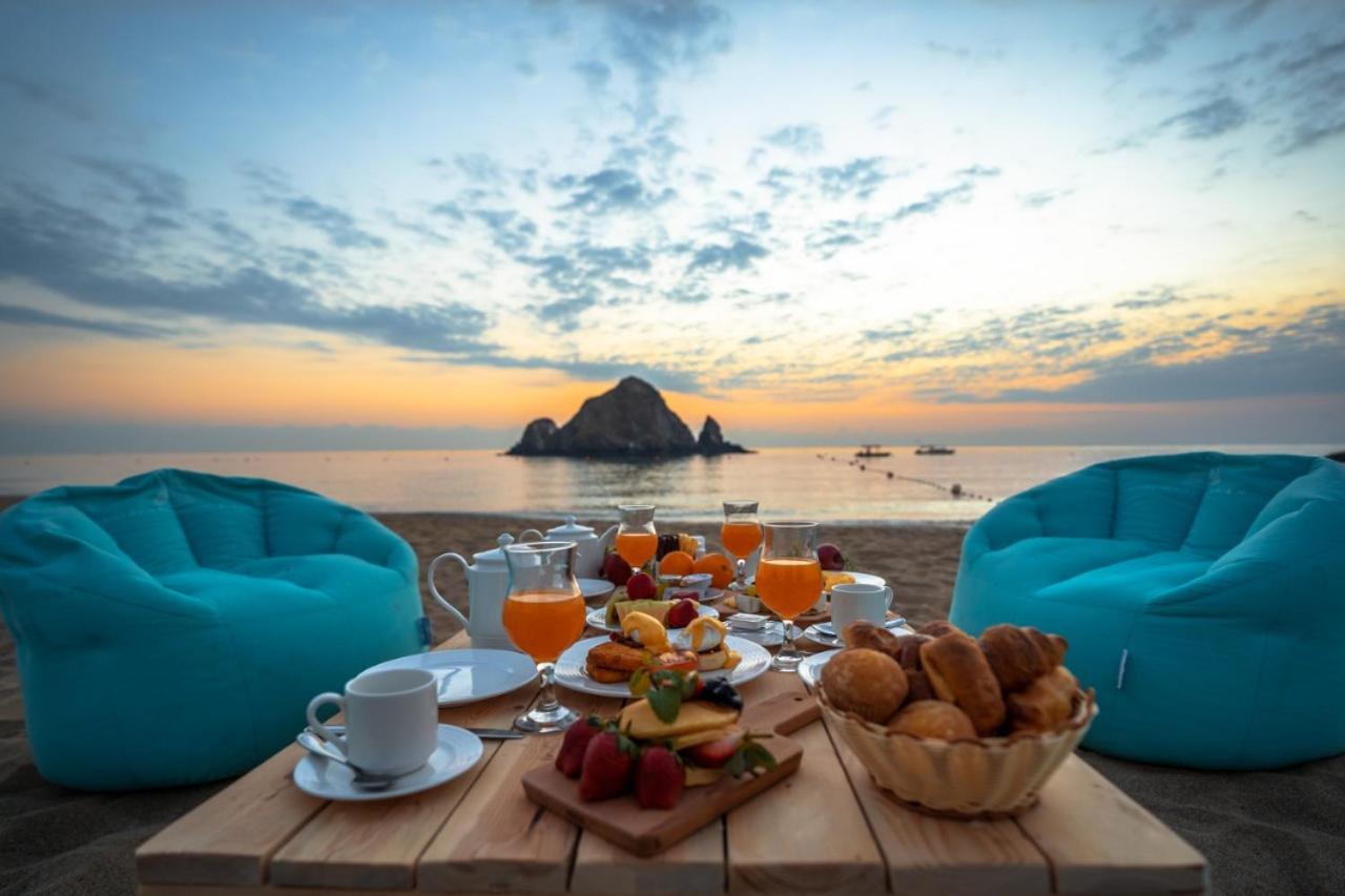 Sandy Beach Hotel & Resort Al Aqah Bagian luar foto